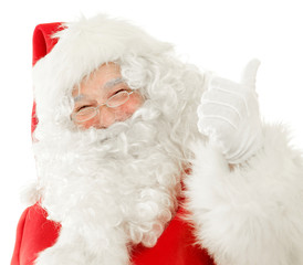 Happy Santa Claus giving the Thumbs Up while cutely smiling, Isolated on White Background cut out