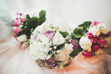 Beautiful wedding bouquet with different flowers, roses