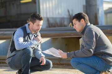 industrial workers talking about the design
