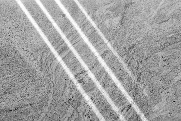 Four lanes of light on a marble wall. Sunbeam in marble wall. Abstract texture background