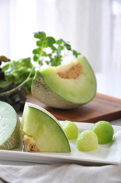 Fresh Green Melon Serve on White Plate