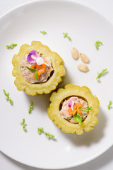 Boiled bitter gourd with pork decorated with carrot and flower,food styling.Top view of food