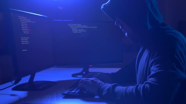 hacker using computer virus for cyber attack