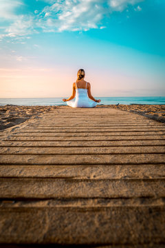 girl doing sport on the beach