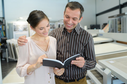 couple looking at brochure