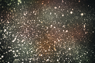 A lot of blurry lights and noise on abstract pattern