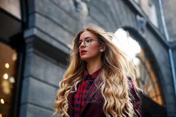 Close up fashion street stile portrait of pretty girl in fall casual outfit Beautiful blond posing...