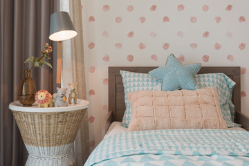 Fototapeta na wymiar kid's bedroom with cozy bed