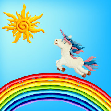Plasticine sculpture Unicorn running on rainbow
