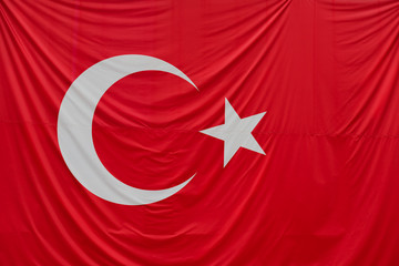 Close up shot of wavy, shiny Turkish flag