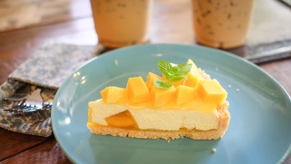 Mango cheese pie with coffee