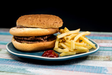 Cheese burger - American cheese burger with Golden French fries