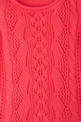 Detailed view on red blouse