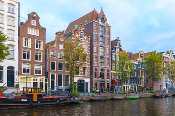 Obraz premium Amsterdam City Center. Beautiful view of Amsterdam Canals and typical Dutch Houses. Amsterdam, Netherlands. .