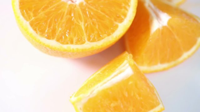 Top view of fresh orange slice on white table. 