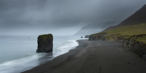 Typical Icelandic seascape with black basalt sand