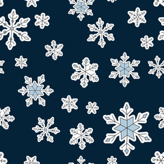 Simple vector Christmas and New Year seamless pattern with snowflakes.