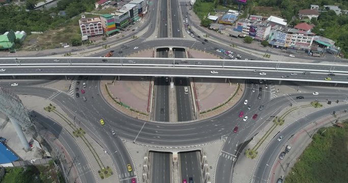 Traffic scene of huge round about, Rama V road junction, 4k video