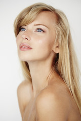 Gorgeous blue eyed blond beauty, looking up