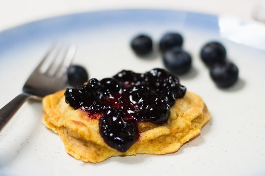 Homemade crumpet with blueberry jam