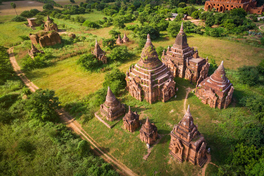 Bagan, Myanmar (Burma), aerial view of ancient temples and pagodas at sunset.