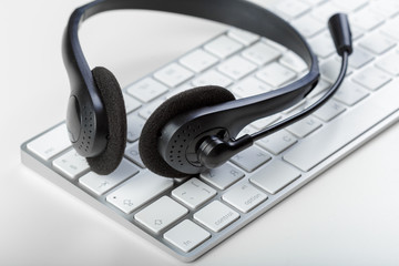 headset on keyboard computer laptop