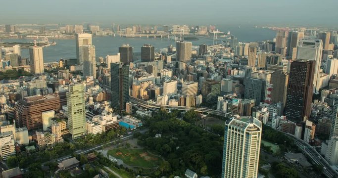 TOKYO, JAPAN – JUNE 2016 : Timelapse of central Tokyo Harbour area on a beautiful day with river and traffic in view, shot from Tokyo Sky Tree tower