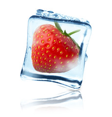 Strawberry frozen in ice cube, isolated