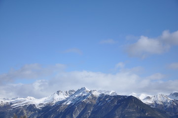 Fototapeta na wymiar Mountain view - clouds, snow, winter, water