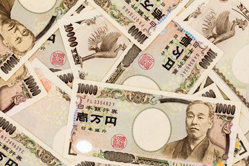 Japanese currency yen bank notes. The yen is the official currency of Japan. It is the third most traded currency in the foreign exchange market after the United States dollar and the euro