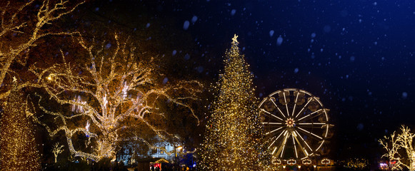 Christmas tree decoration and holidays lights on Christmas Old city street