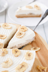 Delicious banana cake on table