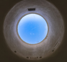 Ceiling circular minimal window in a museum looking up in a sky - 181644499