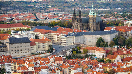 Naklejka na ściany i meble Aerial view of the Old Town architecture with red roofs in Prague , Czech Republic.