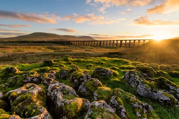 Printed roller blinds North Europe Gorgeous golden light as the sun sets behind the Ribblehead Viaduct with rocks in foreground.