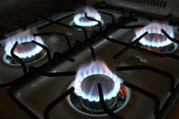 a gas burning stove that's lit