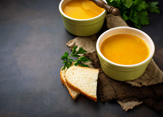 Bowls of hot vegetarian red lentil soup