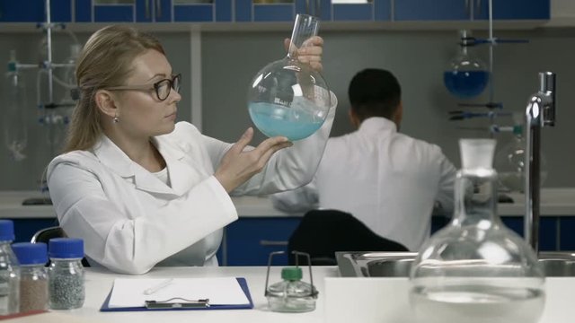Female researcher working in chemistry lab
