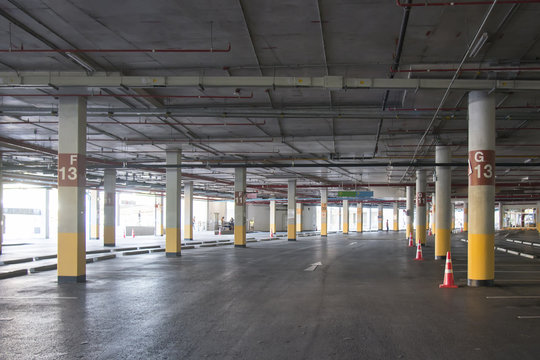 Empty Car parking garage underground interior in supermarket