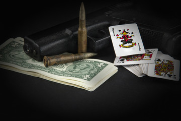 playing cards, gun, ammunitions, money, benjamin,credit card