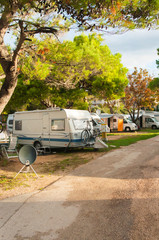 Campers at the campsite - obrazy, fototapety, plakaty