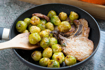 Pork and brussels sprouts in  stove