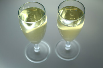 two full glasses on a yellow background
