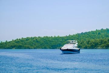 Naklejka na ściany i meble Beautiful seascape with modern boat on sunny day