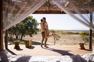 Smiling couple embracing each other