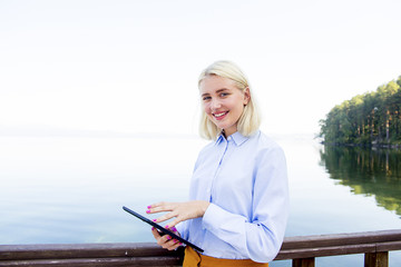 Businesswoman working on a beach