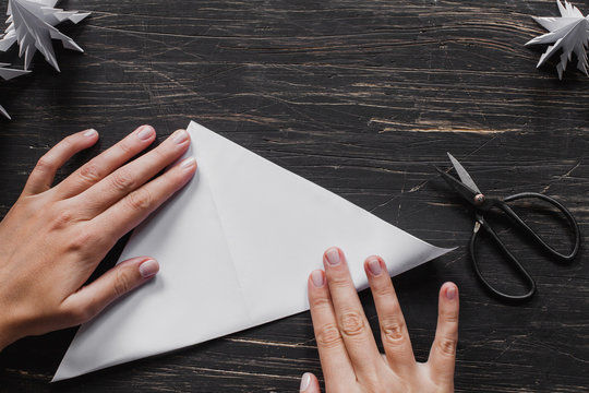 Origami Christmas tree making. Step by step, tutorial with hands