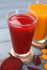 Glasses with various fresh vegetable juices, closeup