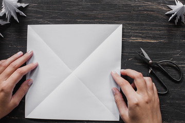 Paper, origami Christmas tree making. Step by step, tutorial with hands