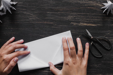 Paper Christmas tree making. Step by step, tutorial, flat lay